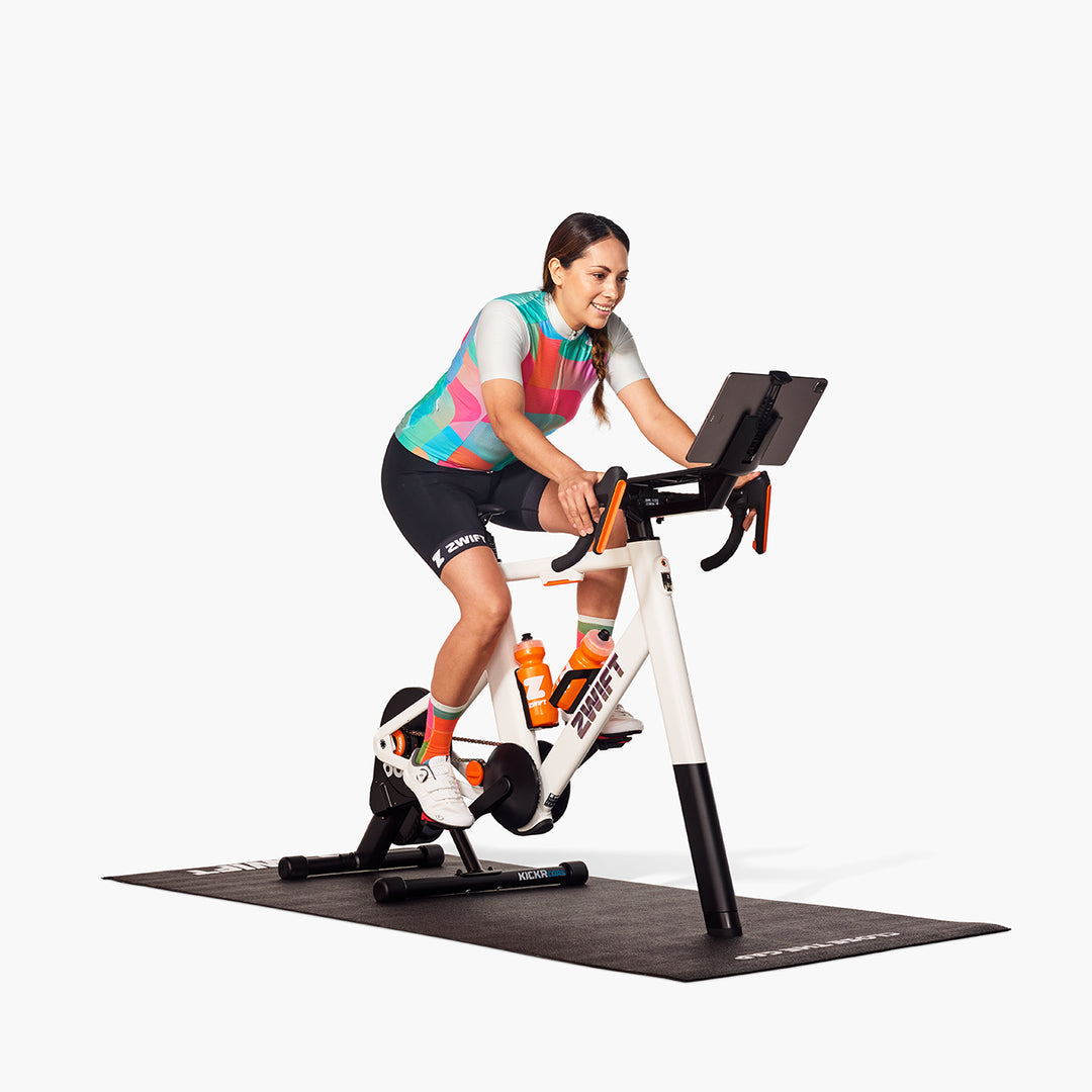 Rider using Zwift Ride with Wahoo KICKR CORE