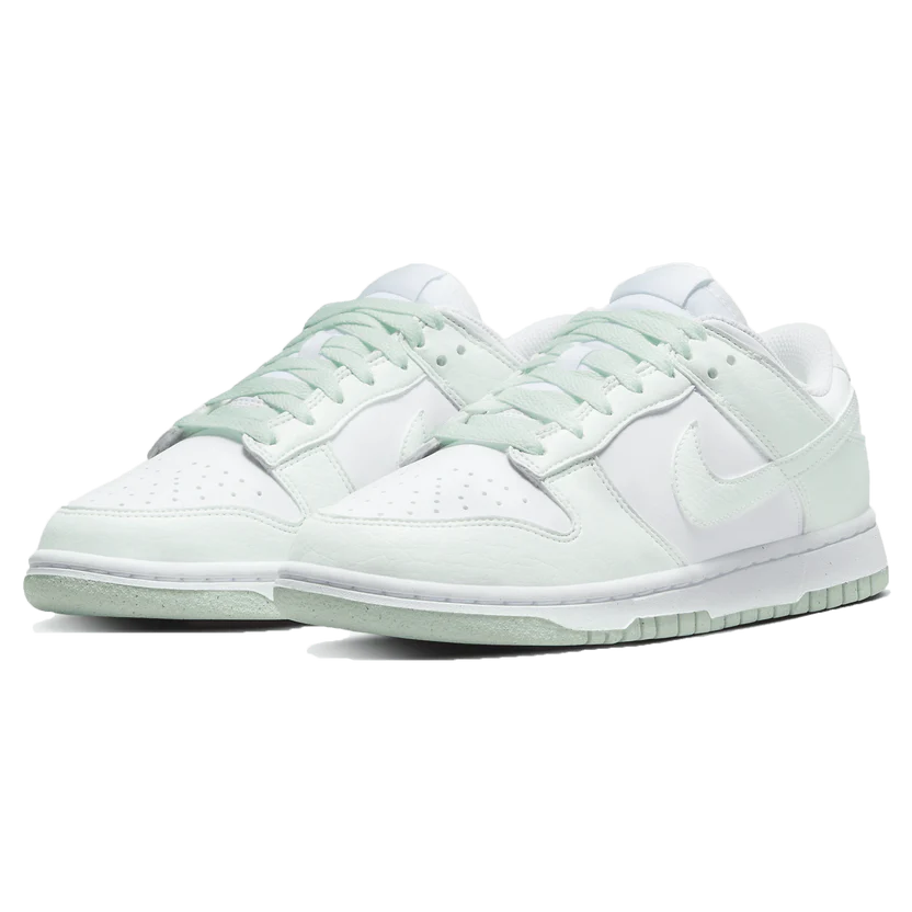 The Nike Dunk Low Next Nature 'Mint' features a pastel two tone colourway of pristine white and mint green hues crafted from sustainable & recycled materials! Perfect for Juniors, Women and Men, this easy to style summer vibes Dunk Low is available in UK3 - UK9.5 and fits true to size. Super comfortable and 100% authentic we can understand the huge demand for these Nike Dunk Low White Mints. Shop them now at DoorstepDrip!